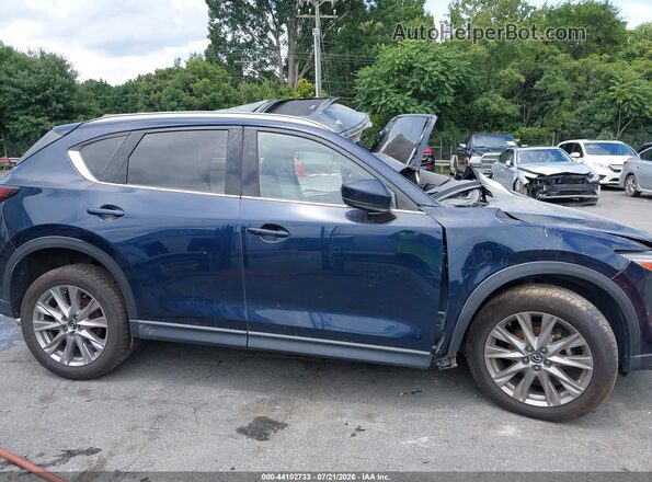JM3KFADM1M0387004 2021 MAZDA CX-5 Blue Սալոնի հետևի տեսք