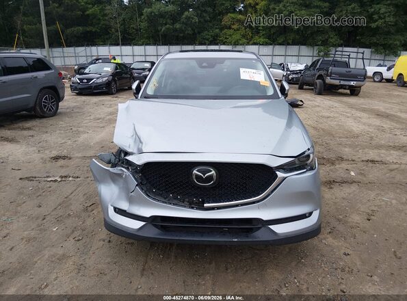 JM3KFADM6M0343807 2021 MAZDA CX-5 Silver Vista interior trasera