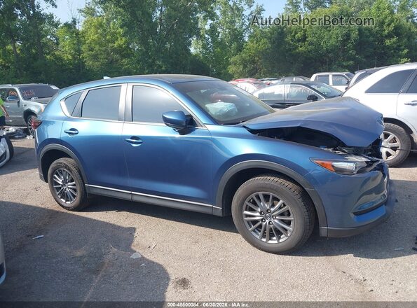 JM3KFBBM0J0430929 2018 MAZDA CX-5 Blue Vista interior trasera