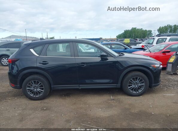 JM3KFBBM4M0365698 2021 MAZDA CX-5 Black Widok wnętrza z tyłu