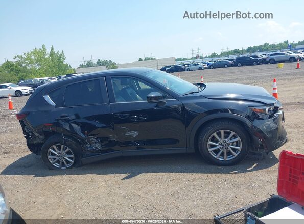 JM3KFBBM8P0286443 2023 MAZDA CX-5 Black Widok wnętrza z tyłu