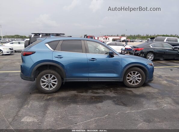 JM3KFBBM9P0190630 2023 MAZDA CX-5 Blue Rear interior view