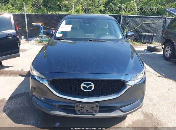 JM3KFBCL0H0126144 2017 MAZDA CX-5 Blue Rear interior view