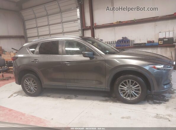 JM3KFBCL6H0219654 2017 MAZDA CX-5 Gray Vista interior trasera