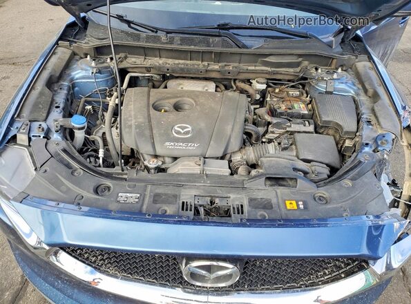 JM3KFBCL8H0107938 2017 MAZDA CX-5 Blue Rear interior view