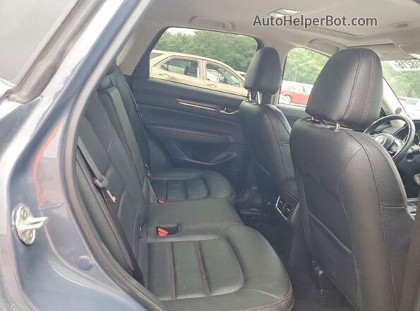 JM3KFBCL8R0513302 2024 MAZDA CX-5 Blue Vista interior trasera