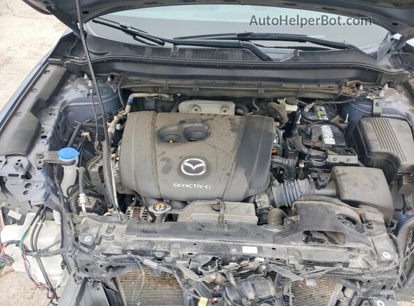 JM3KFBCL8R0513302 2024 MAZDA CX-5 Blue Vista del compartimento del motor