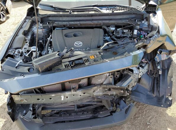 JM3KFBCL9S0730685 2025 MAZDA CX-5 Charcoal Vista del compartimento del motor