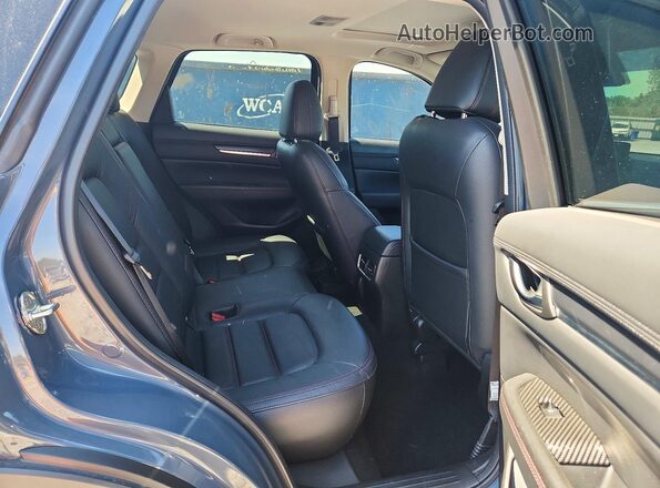 JM3KFBCLXR0459517 2024 MAZDA CX-5 Teal Vista interior trasera