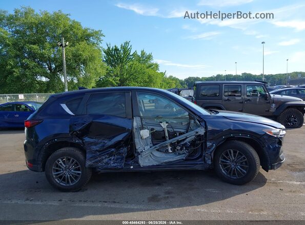 JM3KFBCM0M1335705 2021 MAZDA CX-5 Dark Blue Vista interior trasera
