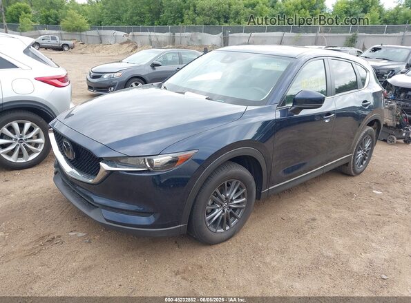 JM3KFBCM1M1423579 2021 MAZDA CX-5 Blue Vista tres cuartos delantera izquierda