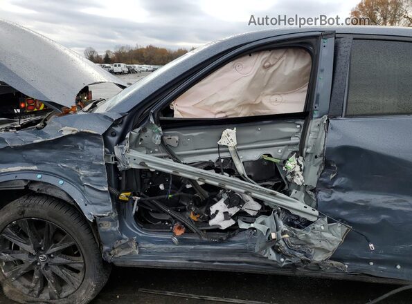 JM3KFBCM2N1551900 2022 MAZDA CX-5 Blue Vista interior delantera