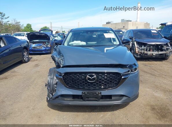 JM3KFBCM3S0624306 2025 MAZDA CX-5 Light Blue Instrument cluster view