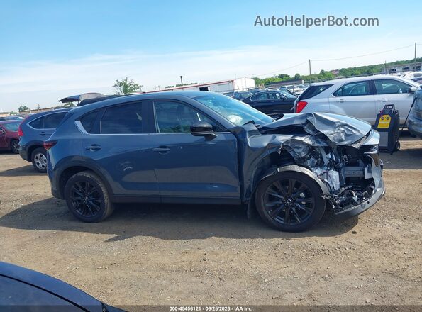 JM3KFBCM3S0624306 2025 MAZDA CX-5 Light Blue Rear interior view