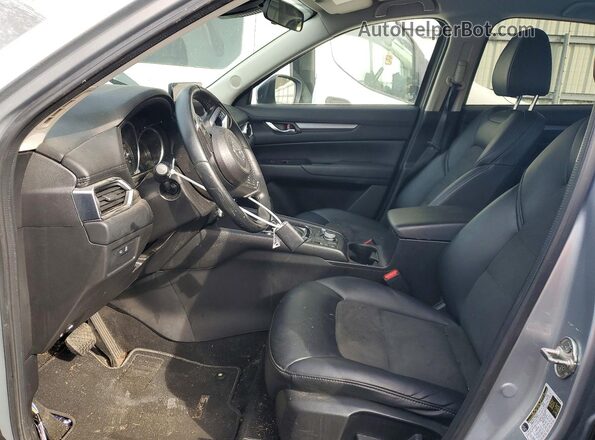 JM3KFBCM5M0345801 2021 MAZDA CX-5 Серебряный Вид салона спереди