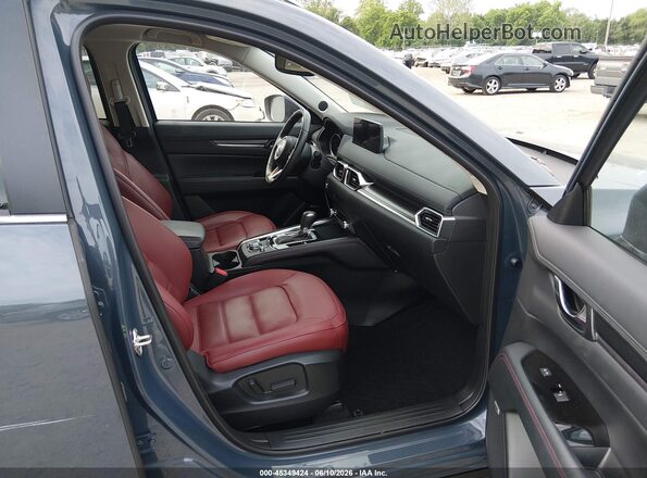 JM3KFBCM5P0250059 2023 MAZDA CX-5 Blue Vista interior delantera