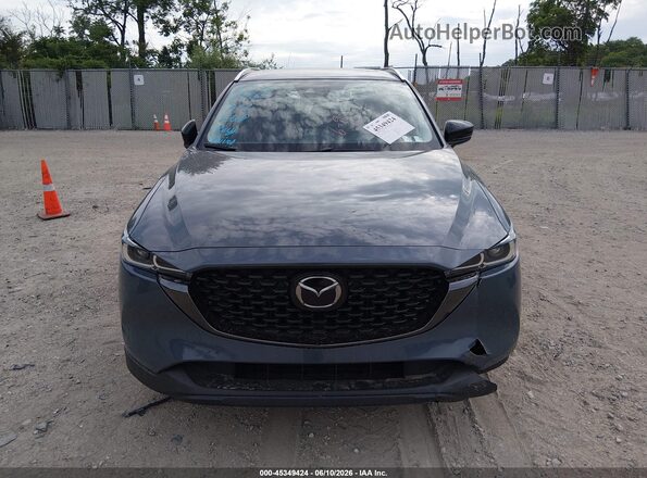 JM3KFBCM5P0250059 2023 MAZDA CX-5 Blue Vista interior trasera