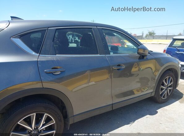 JM3KFBCM6J0429430 2018 MAZDA CX-5 Gray Widok wnętrza z tyłu