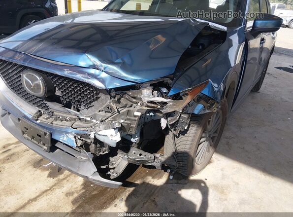 JM3KFBCM6M1491991 2021 MAZDA CX-5 Blue Вид спереду