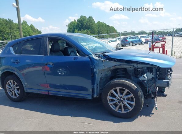 JM3KFBCM6R0367667 2024 MAZDA CX-5 Light Blue Սալոնի 360 աստիճան տեսք