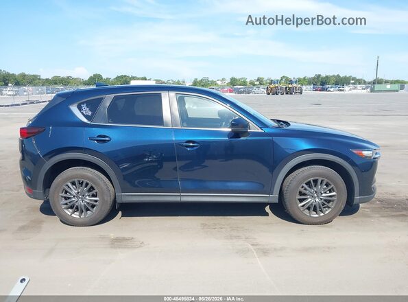 JM3KFBCM7M0405108 2021 MAZDA CX-5 Blue Rear interior view