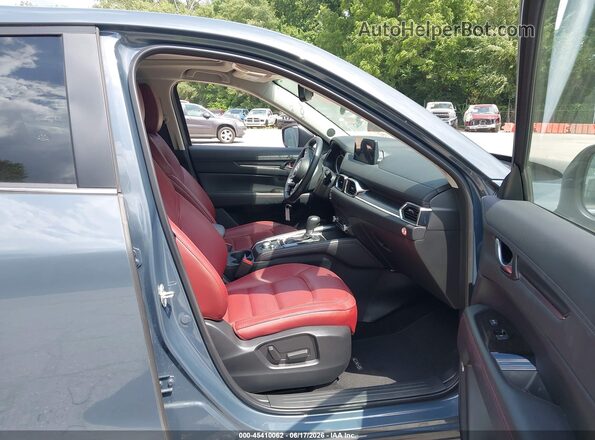 JM3KFBCM7S0702263 2025 MAZDA CX-5 Light Blue Вид салону спереду