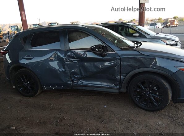 JM3KFBCM8P0180900 2023 MAZDA CX-5 Blue Вид задньої частини салону