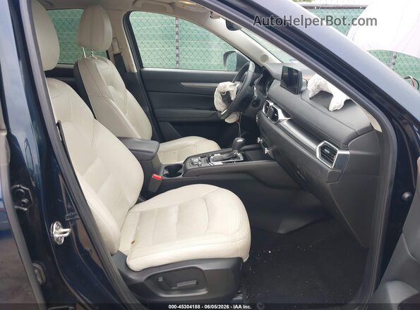 JM3KFBCM8P0229903 2023 MAZDA CX-5 Blue Widok wnętrza z przodu