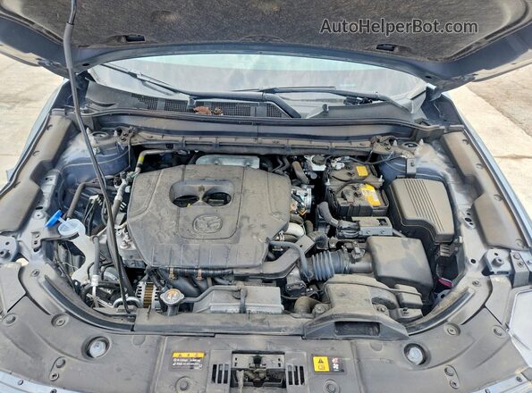 JM3KFBCM9S0602746 2025 MAZDA CX-5 Blue Widok wnętrza z tyłu