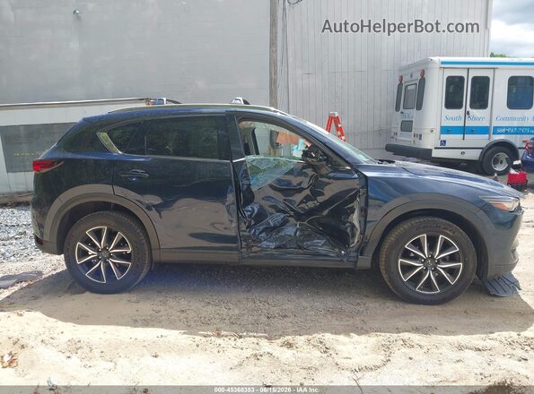 JM3KFBDL2H0134213 2017 MAZDA CX-5 Dark Blue Rear interior view