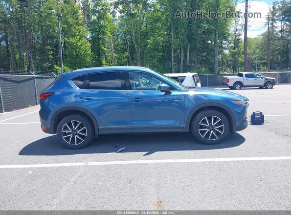 JM3KFBDLXH0169744 2017 MAZDA CX-5 Blue Widok wnętrza z tyłu