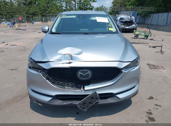 JM3KFBDM0J0320699 2018 MAZDA CX-5 Silver Rear interior view