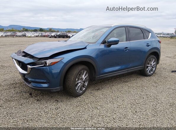 JM3KFBDM4M1406371 2021 MAZDA CX-5 Blue წინა მარცხენა ხედი სამი მეოთხედიდან