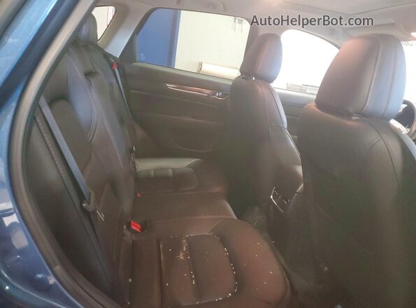 JM3KFBDM6M0487542 2021 MAZDA CX-5 Blue Widok wnętrza z tyłu