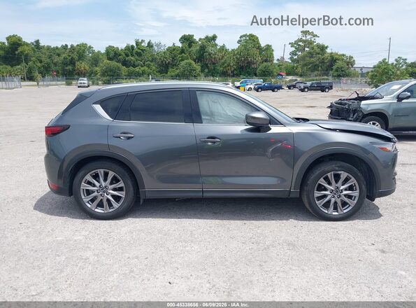 JM3KFBDM7M0434848 2021 MAZDA CX-5 Gray Սալոնի հետևի տեսք
