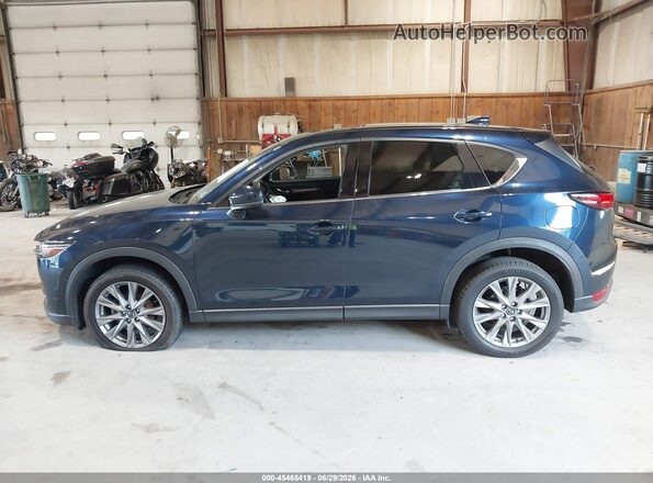JM3KFBDM9M0307986 2021 MAZDA CX-5 Dark Blue Rear interior view