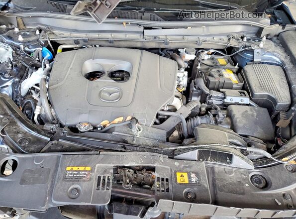 JM3KFBEM1R0384745 2024 MAZDA CX-5 Blue Vista interior trasera
