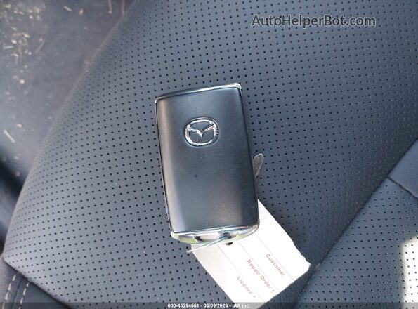 JM3KKCHA6T1374040 2026 MAZDA CX-90 PHEV Gray Vista del salpicadero