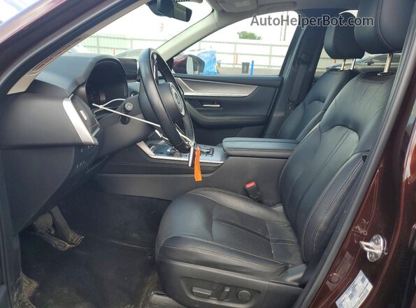 JM3KKDHA0R1112657 2024 MAZDA CX-90 Бордовый Вид салона спереди