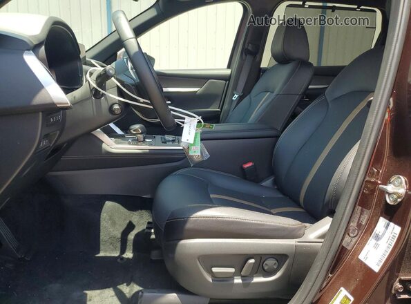 JM3KKEHC1T1350483 2026 MAZDA CX-90 Burgundy Widok wnętrza z przodu