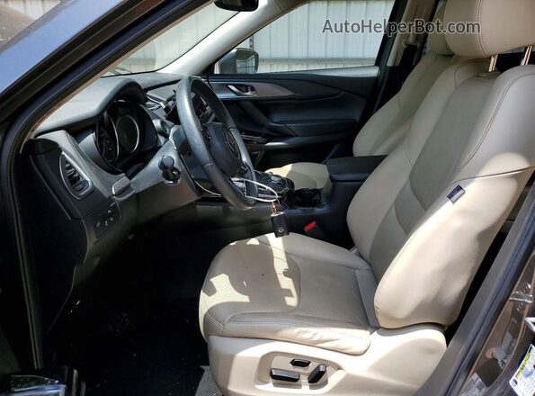 JM3TCBCY5M0535582 2021 MAZDA CX-9 Серый Вид салона спереди