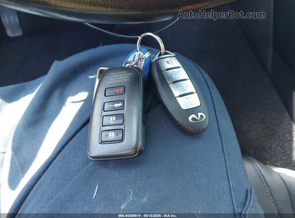 JN1CV7EK6JM200217 2018 INFINITI Q60 Gold Вид панелі приладів