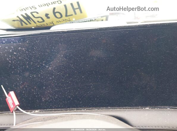 JN1DF0BB1RM742852 2024 NISSAN ARIYA White Vista de los asientos traseros