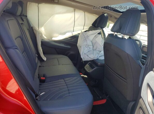 JN1DF0CD0RM737738 2024 NISSAN ARIYA Red Vista interior trasera