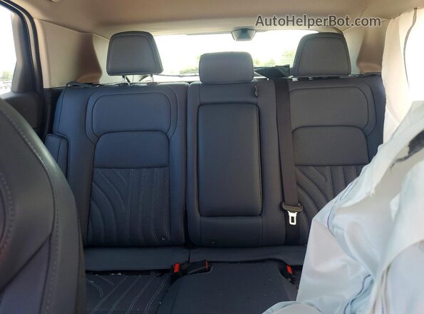 JN1DF0CD0RM737738 2024 NISSAN ARIYA Red Vista de los asientos traseros