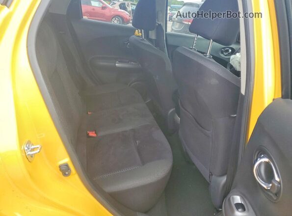 JN8AF5MRXGT603785 2016 NISSAN JUKE Yellow Widok wnętrza z tyłu