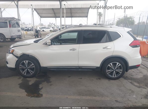 JN8AT2MT5HW403576 2017 NISSAN ROGUE Cream 360 interior view