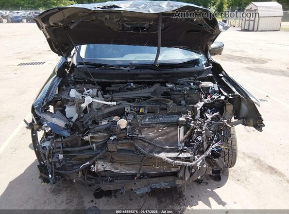 JN8AT2MV7HW024211 2017 NISSAN ROGUE Green Rear view
