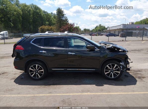 JN8AT2MV7HW024211 2017 NISSAN ROGUE Green 360 interior view