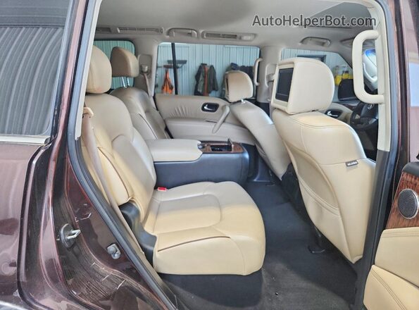 JN8AY2NE3H9700653 2017 NISSAN ARMADA Maroon Rear interior view